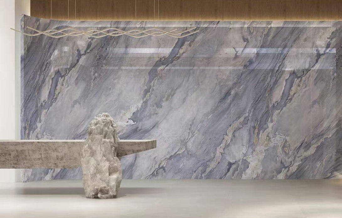 A polished stone panel with a deep blue tone and continuous flowing veining, presented as a book-matched pattern.
