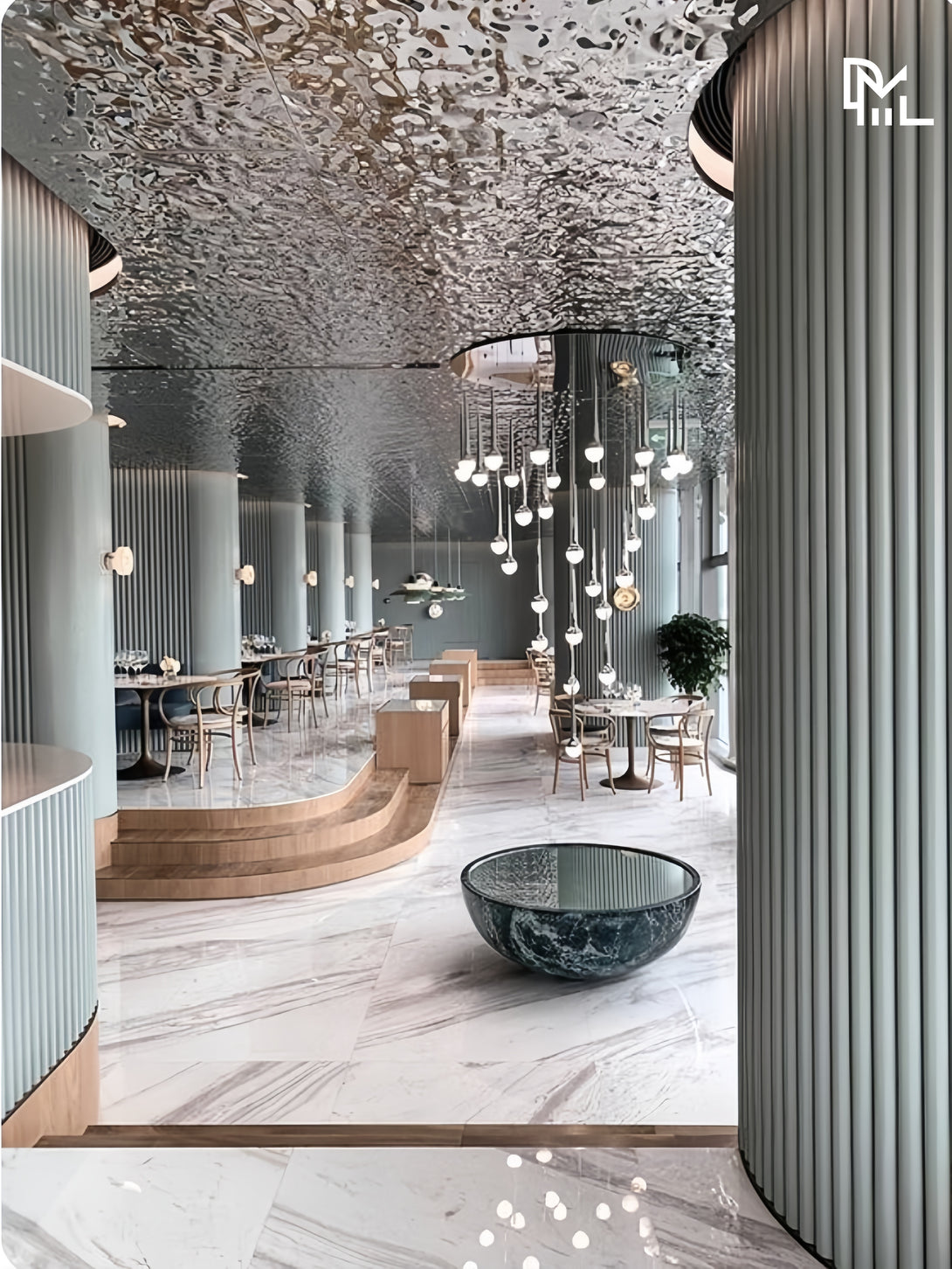 Modern interior design with marble flooring, glass tables, and decorative ceiling lights.